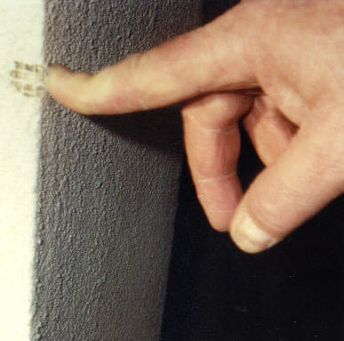Peeling stucco in Tuscon.