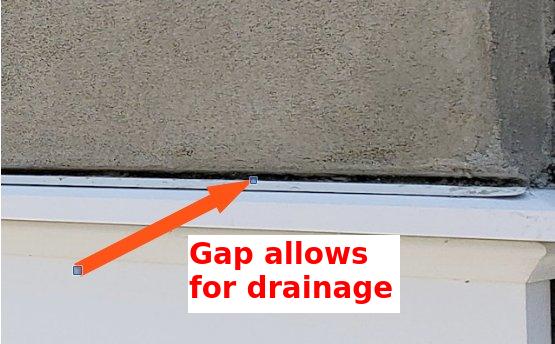 A gap is left at the bottom for the drainage mat.