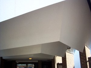 cool
                stucco facade and canopy ceiling