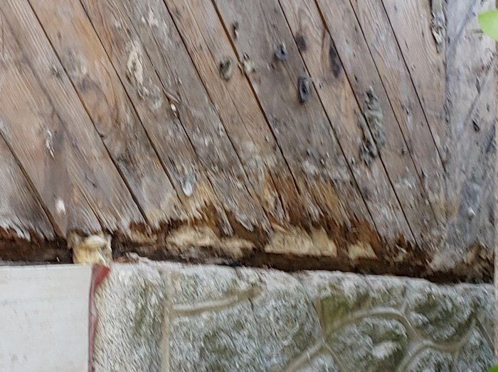 Rotted sill plate caused stucco to bulge in Washington, DC.