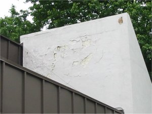 Lack of
                coping flashing damages stucco
