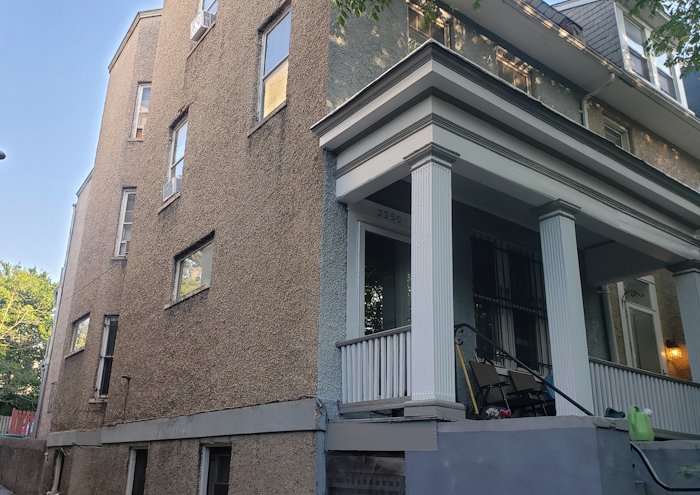Stucco rowhouse in Mount Pleasant